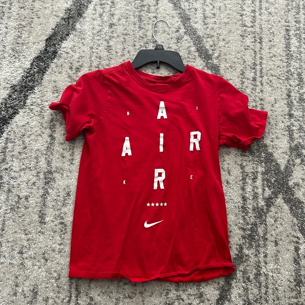 Red Nike air T-shirt. Large in kids.